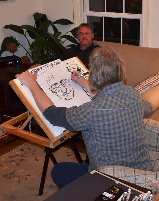 Charlie drawing a guest at a party
